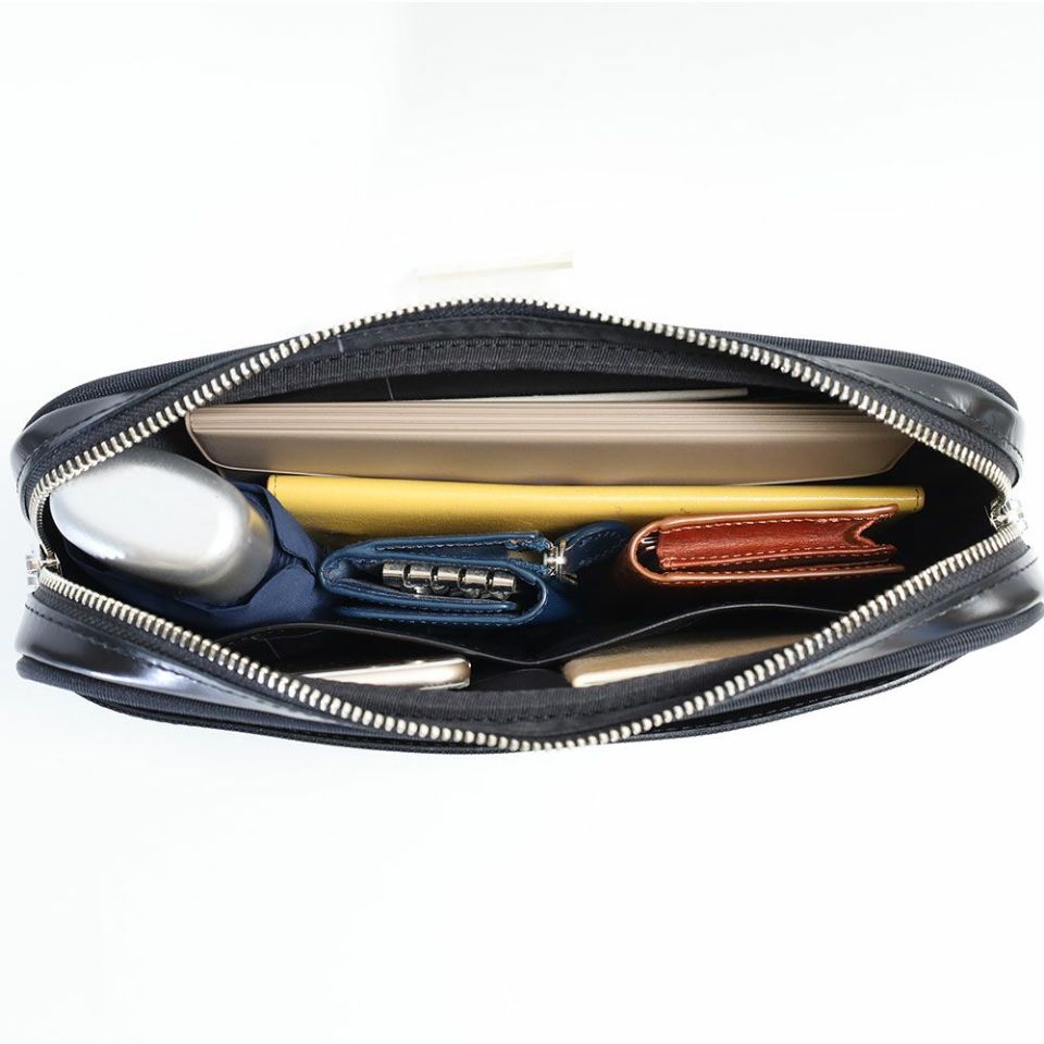 aniary エフ-フィルム クラッチバッグ | TOZAI NANBOKUYA