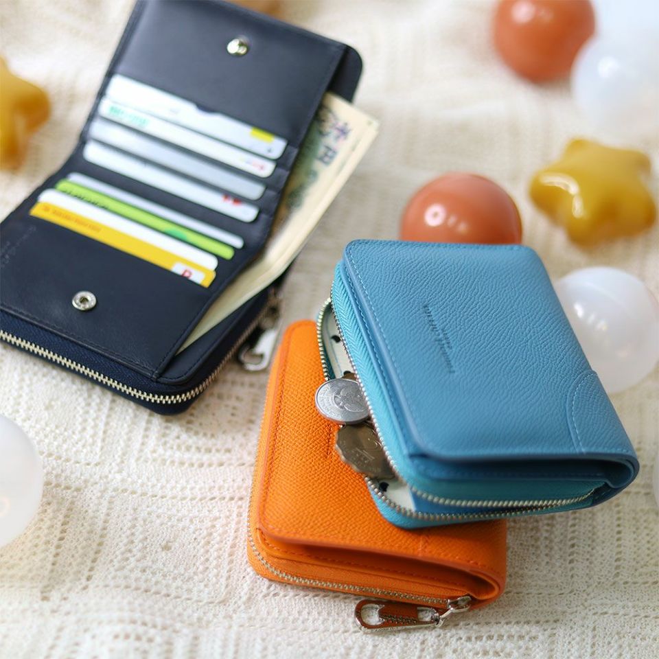 tsumori chisato CARRY ラックスtcネーム 二つ折り財布 | TOZAI NANBOKUYA